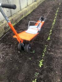 Plantmachine paperpot transplanter